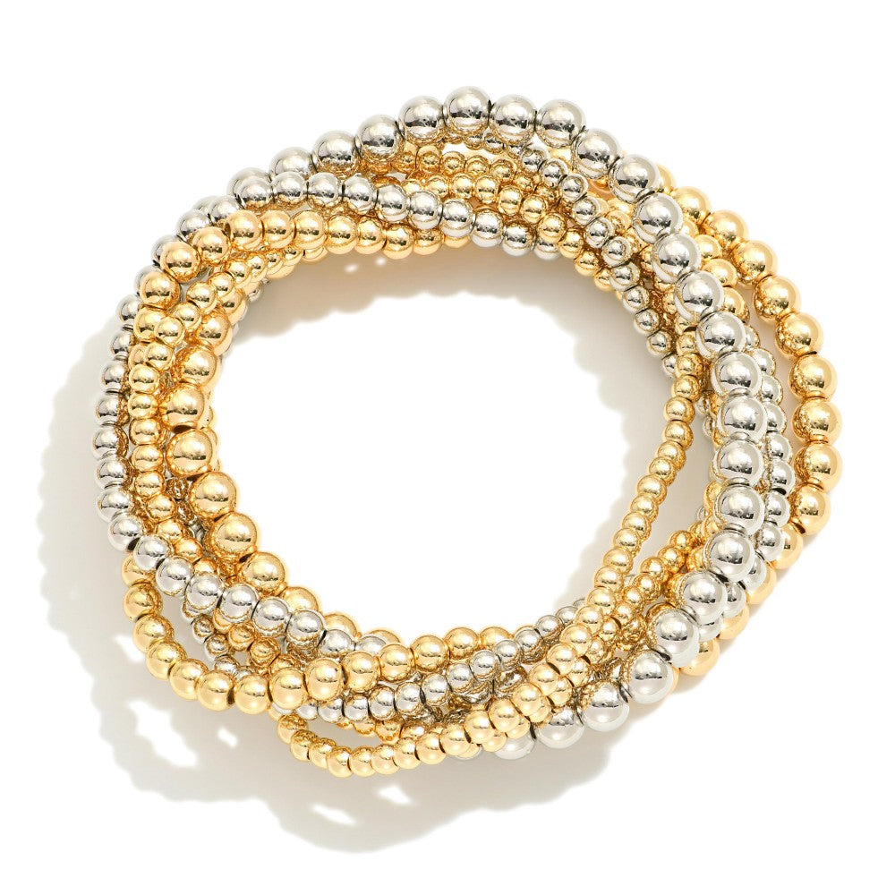 Set Of Seven Metal Tone Bracelets