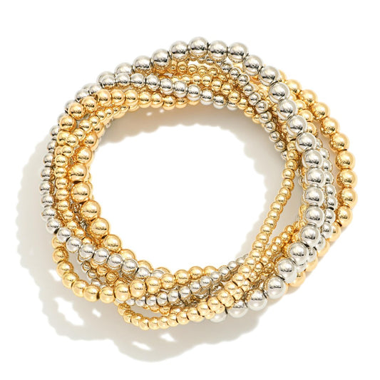 Set Of Seven Metal Tone Bracelets