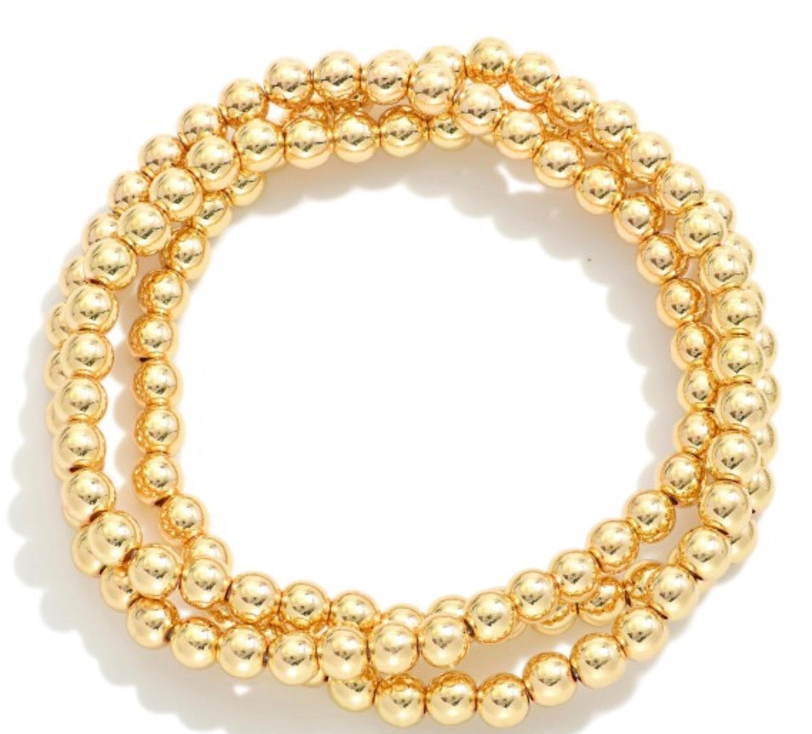 Three Metal Tone Braclets
