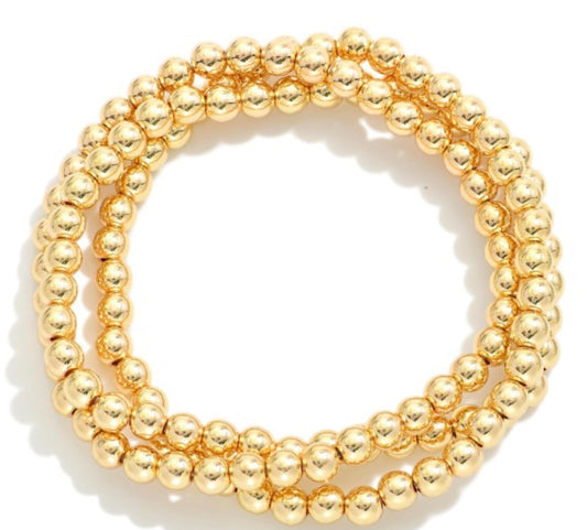 Three Metal Tone Braclets